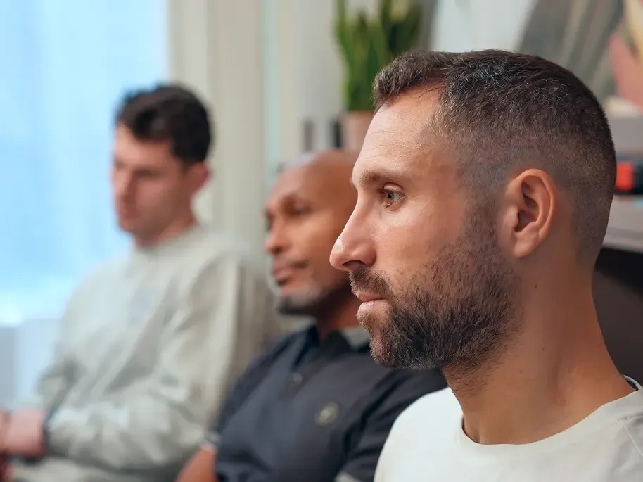 Séance de coaching sportif à domicile - Exercice de squat